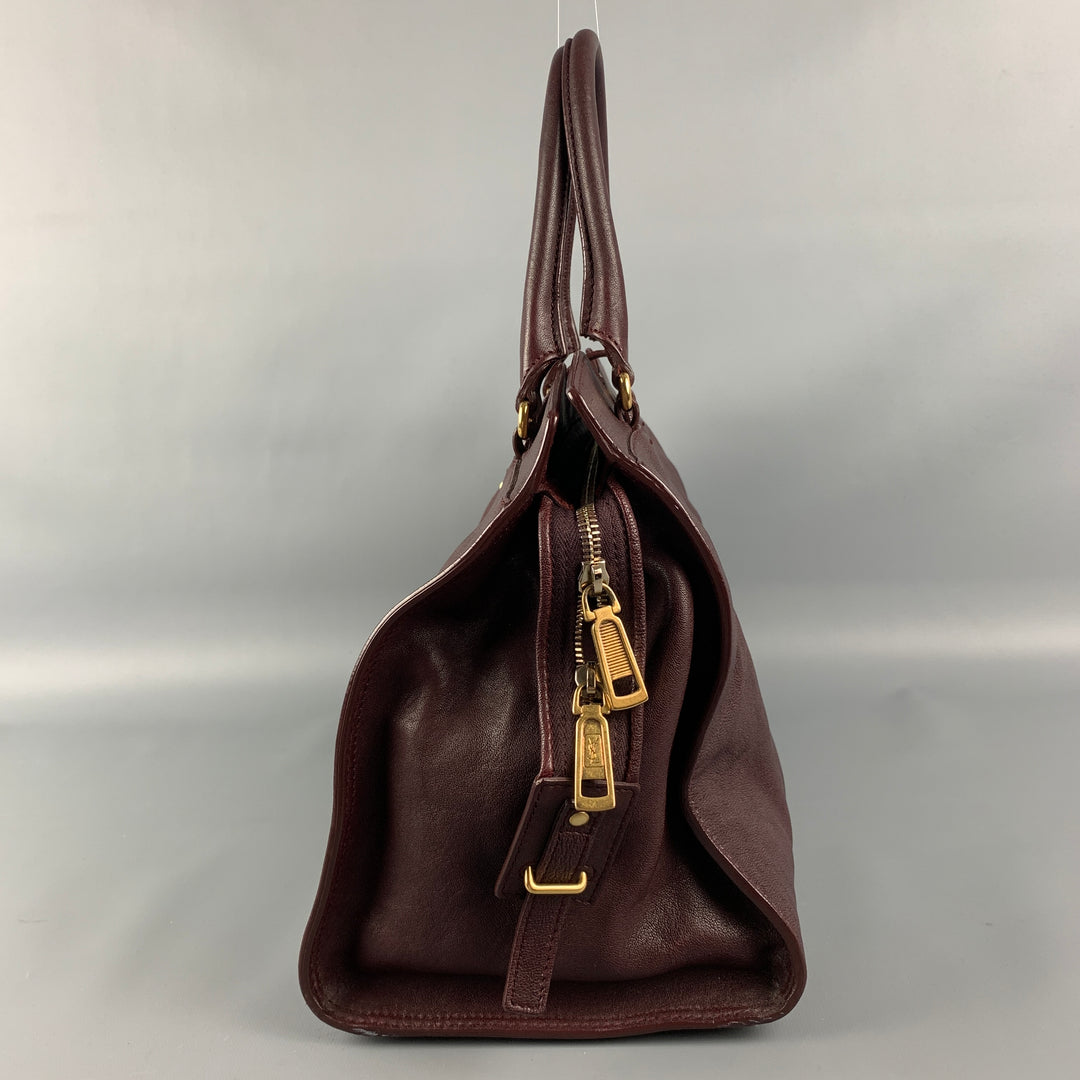 YVES SAINT LAURENT 2012 CABAS Bolso de cuero color burdeos con herrajes dorados