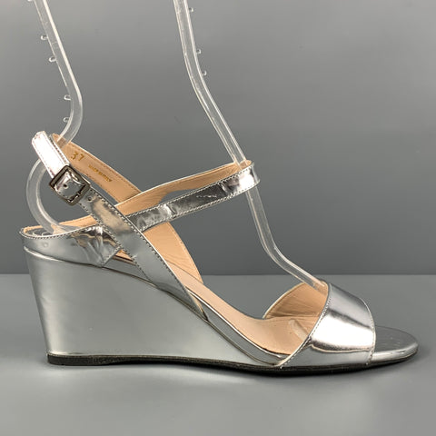Cuñas con tira trasera metálica plateada PRADA Talla 7