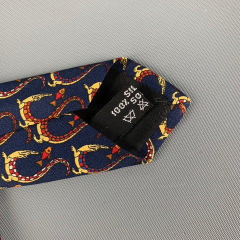 SALVATORE FERRAGAMO Corbata de seda estampada amarilla azul marino