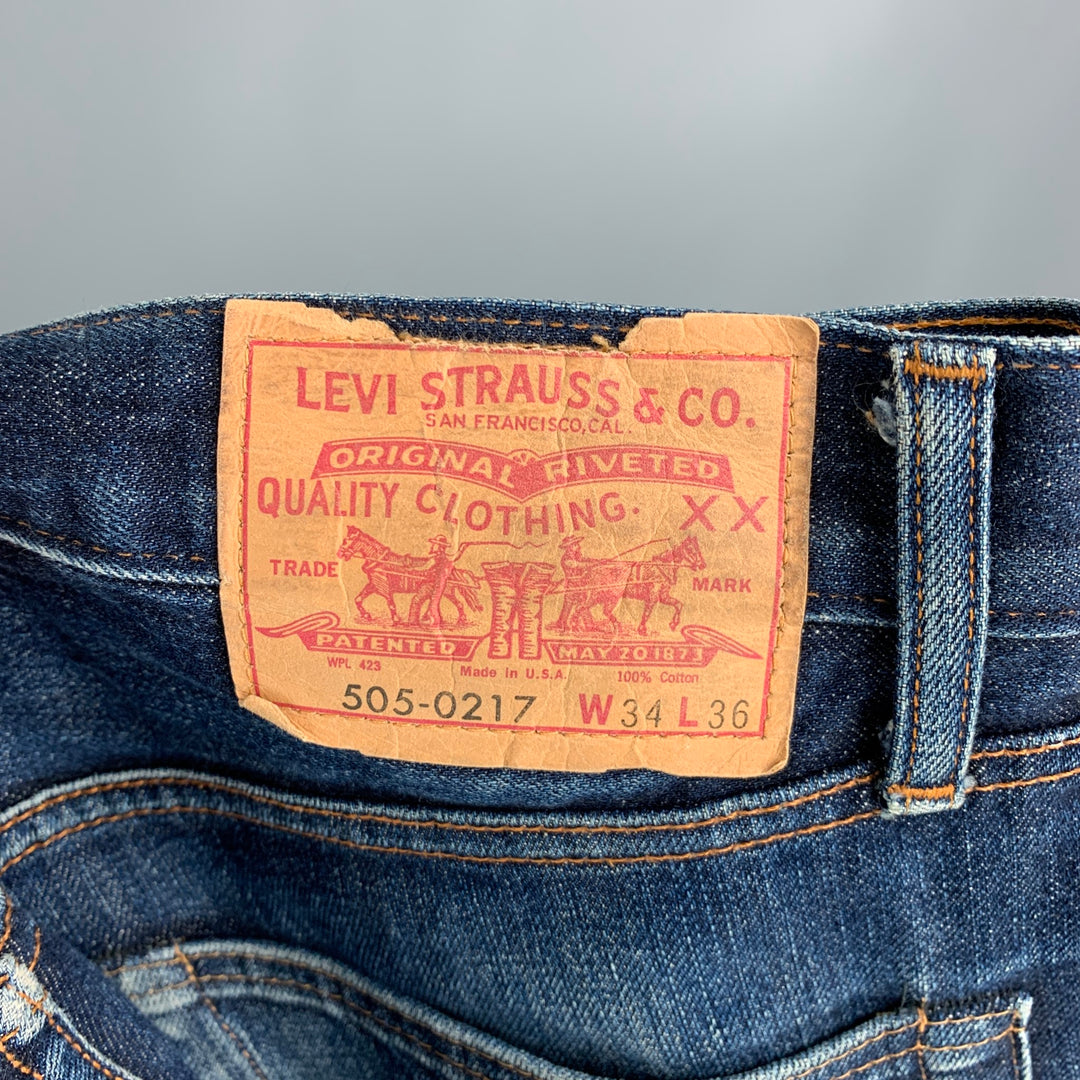 LEVI'S Taille 34 Jean à revers en denim délavé bleu