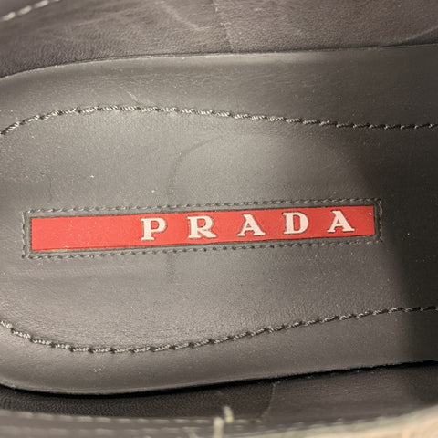 PRADA Talla 9.5 Zapatillas con cordones y entresuela trenzada de ante gris