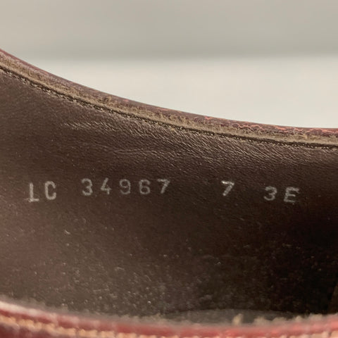 SALVATORE FERRAGAMO Size 7 Burgundy Perforated Leather Wingtip Lace Up Shoes