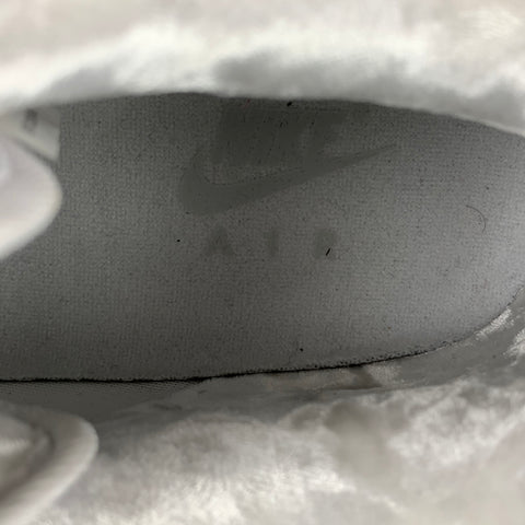NIKE Talla 10.5 Zapatillas bajas de cuero de telas mixtas blancas