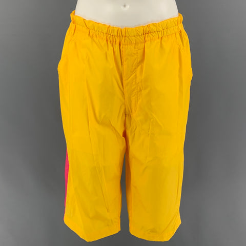 CAMISA COMME des GARCONS Talla S Pantalón corto de poliamida con rayas amarillas y rosas