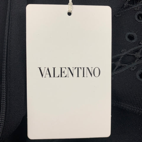 VALENTINO Taille S Robe trapèze en polyester viscose à œillets noirs