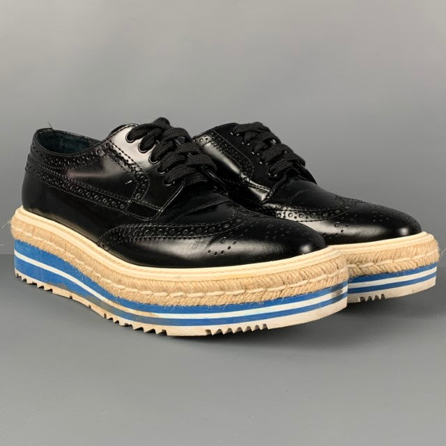 PRADA Size 6.5 Black White Blue Perforated Wingtip Shoes