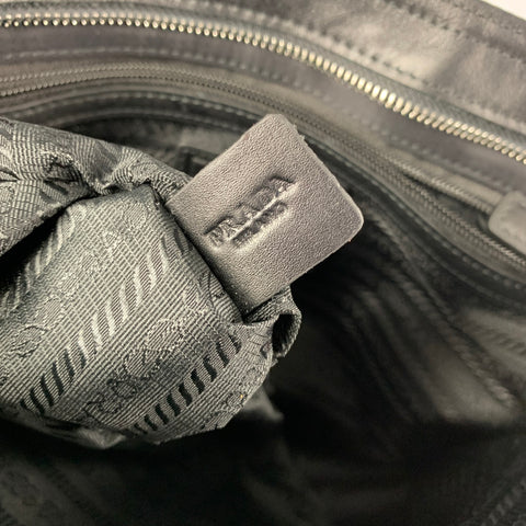 Sac messager à bandoulière en nylon et cuir noir PRADA