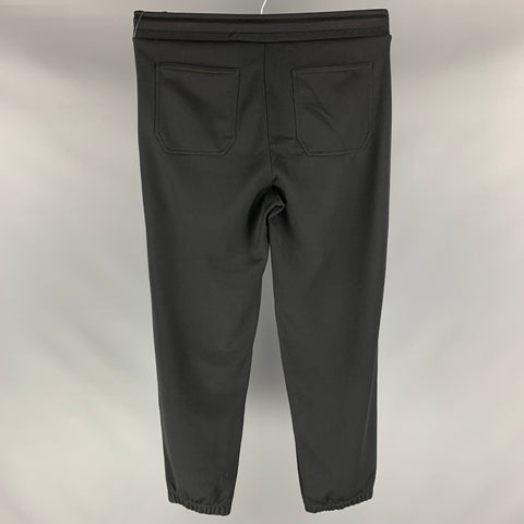 GIVENCHY Talla L Pantalones deportivos de algodón y poliéster lisos negros Pantalones casuales
