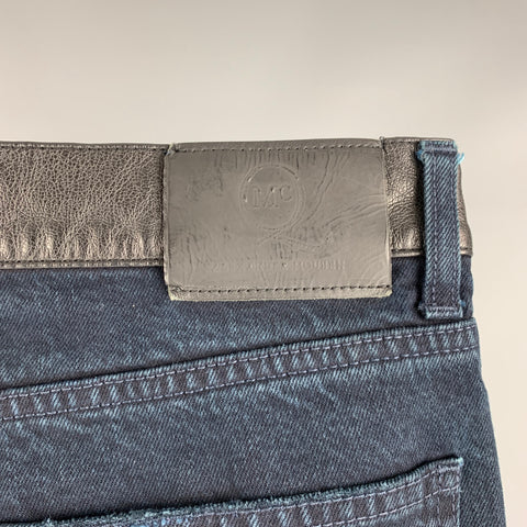 MCQ by ALEXANDER MCQUEEN Talla 32 Vaqueros de algodón desgastados azul marino