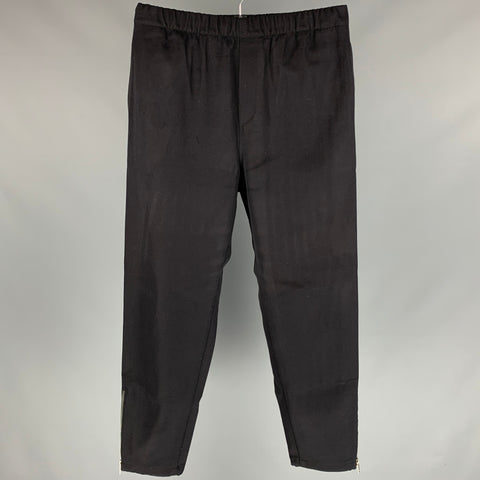 GIVENCHY Talla 32 Pantalones casuales con cinturilla elástica de poliéster / lana negro