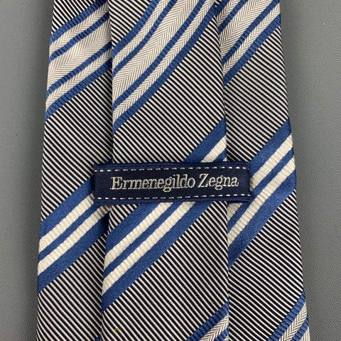 ERMENEGILDO ZEGNA Cravate en soie / coton à rayures diagonales bleues et blanches