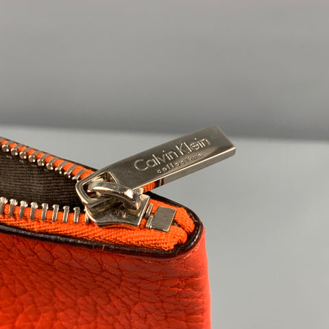CALVIN KLEIN COLLECTION Orange Textured Leather Pouch Bag