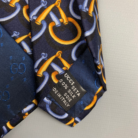 Corbata de seda ecuestre azul marino y dorada de GUCCI