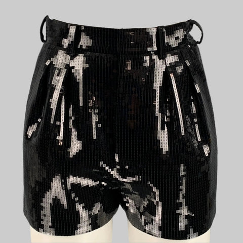 Black sequined wool pleated shorts with a high-rise waist and side pockets, displayed on a mannequin.