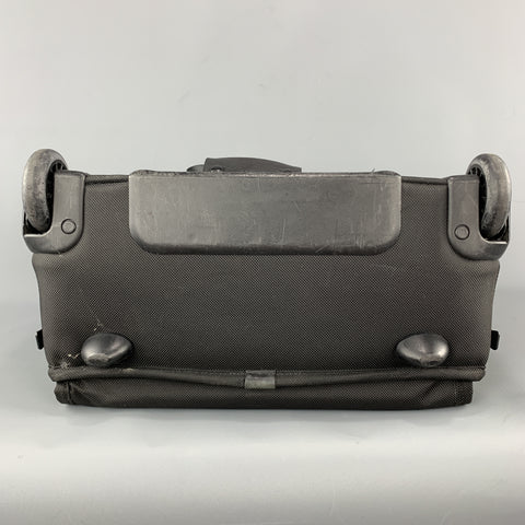 TUMI Black Nylon Canvas Roller Suitcase