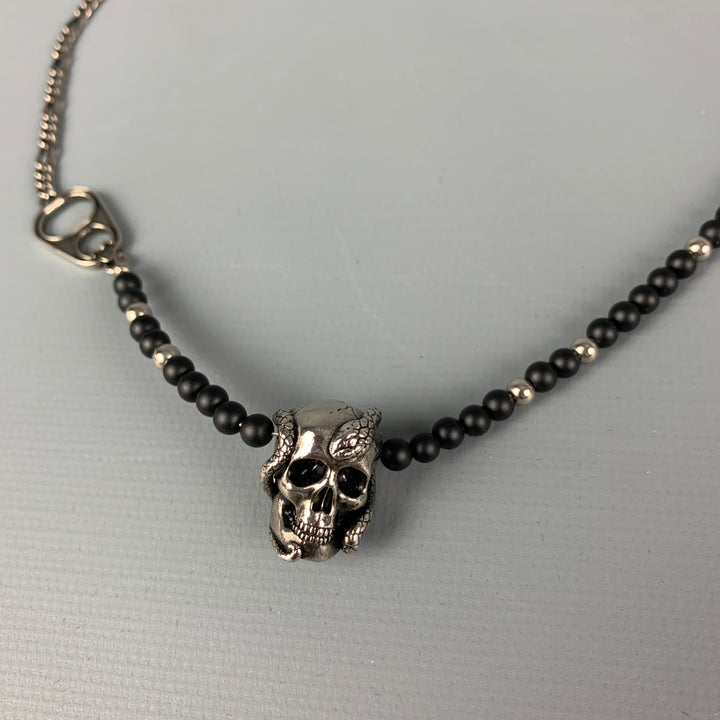 ALEXANDER MCQUEEN Collar de metal con calavera en tono plateado