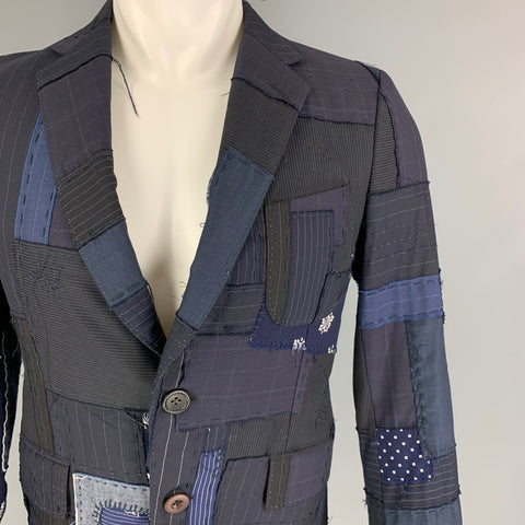 JUNYA WATANABE Abrigo deportivo de mezcla de lana con patchwork en color negro y azul marino talla S