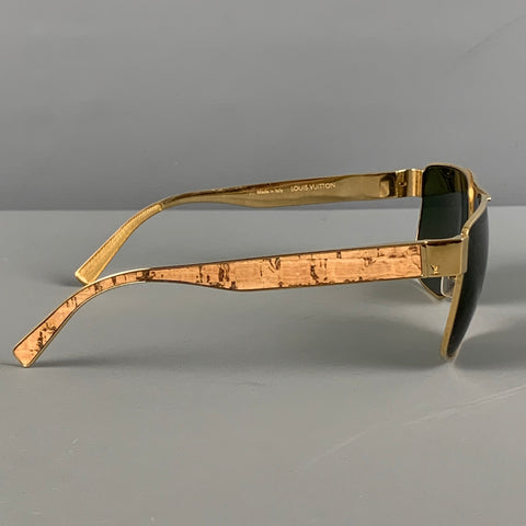 Gafas de sol LOUIS VUITTON de metal con vetas de madera en tono dorado
