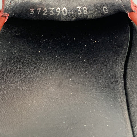 Mocasines tipo driver de grano guijarro de cuero ladrillo talla 8 de GUCCI