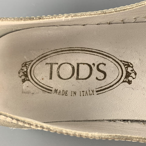 Zapatos planos sin cordones de cuero dorado talla 7.5 de TOD'S