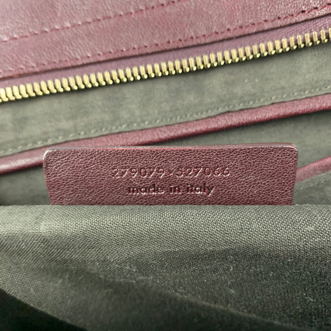 YVES SAINT LAURENT 2012 CABAS Bolso de cuero color burdeos con herrajes dorados