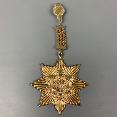 Broche en métal étoiles dorées VINTAGE