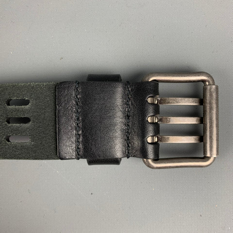 SAINT LAURENT Ceinture en cuir perforé noir taille 36