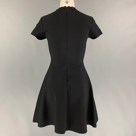 VALENTINO Taille S Robe trapèze en polyester viscose à œillets noirs