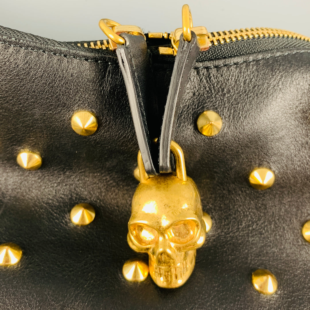 alexander mcqueen studded leather backpack Wellington Hunters and Collectors Featuring adjustable padded shoulder straps and two side pockets with folded flap detailing Alexander Mcqueen Studded Skull Bag