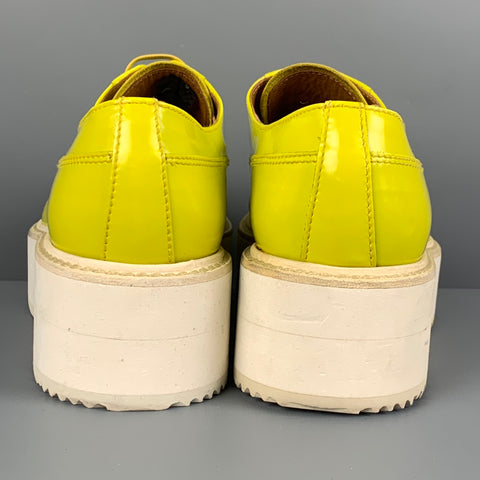 PRADA Taille 11 Chaussures à lacets en cuir jaune blanc