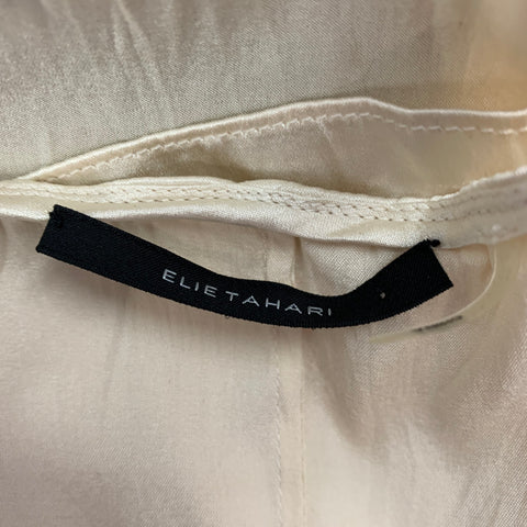 ELIE TAHARI Blouse caraco en soie froissée crème taille S