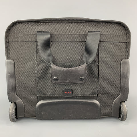 TUMI Black Nylon Canvas Roller Suitcase