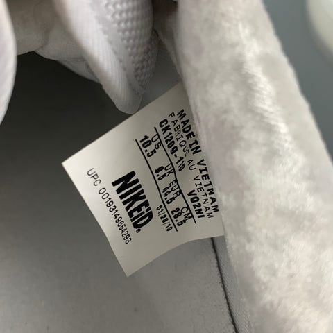 NIKE Talla 10.5 Zapatillas bajas de cuero de telas mixtas blancas