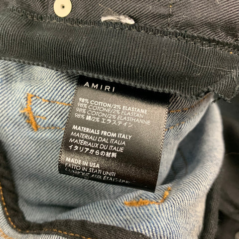 AMIRI Talla 27 Vaqueros Thrasher de pierna estrecha desgastados de algodón azul