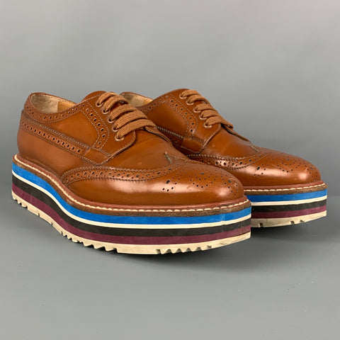 PRADA Talla 6.5 Zapatos con punta de ala perforada de cuero color canela