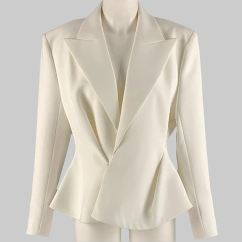 An off-white, single-breasted ALEXANDER VAUTHIER blazer with a peak lapel and button closure, displayed on a mannequin.