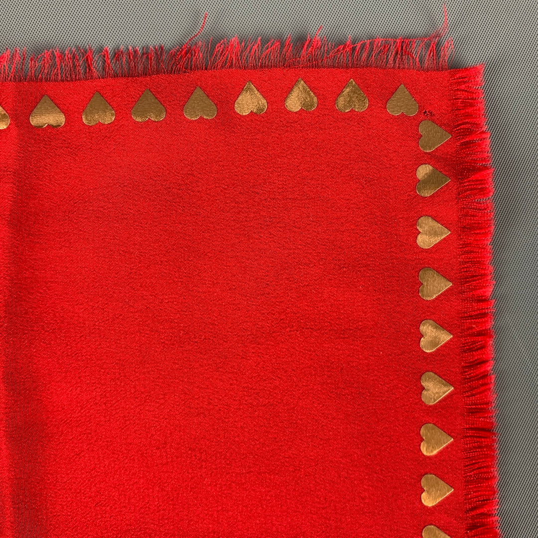 Pañuelo de bolsillo con forma de corazón en oro rojo de YSL