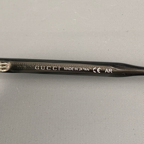 GUCCI Lunettes de soleil et lunettes en acétate de titane gris argent