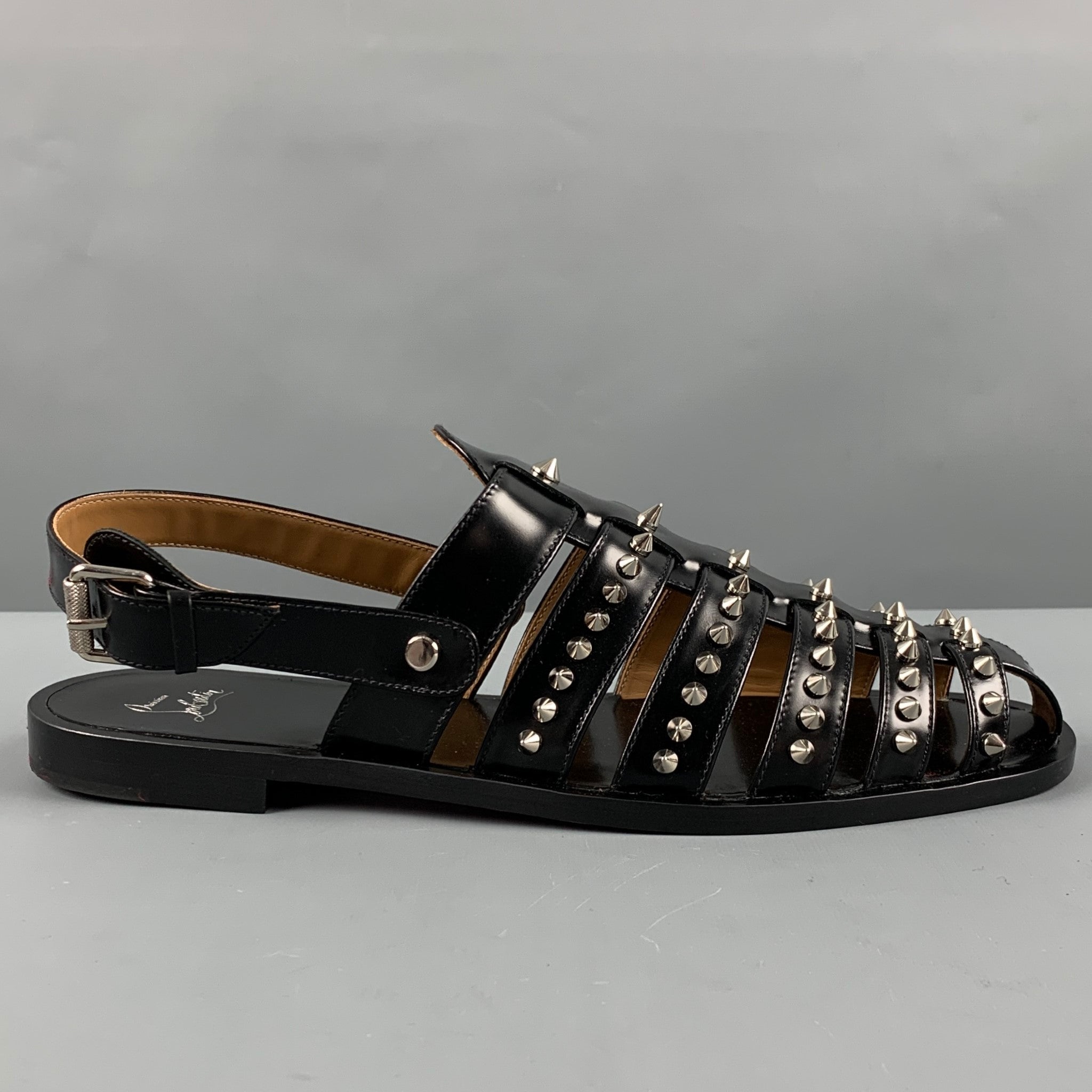 CHRISTIAN LOUBOUTIN Talla 10 Sandalias con tiras de cuero con tachuelas negras