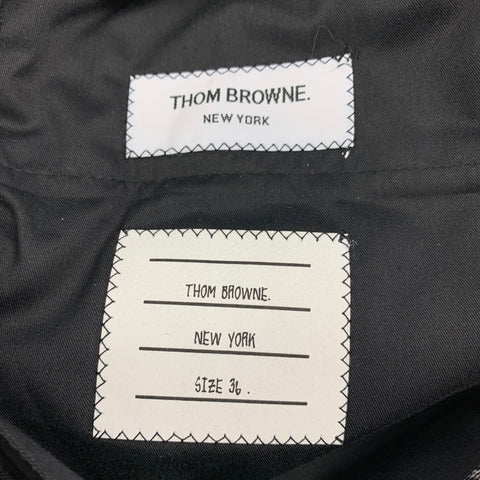 THOM BROWNE Talla 0 Pantalón de vestir con puños de lana a cuadros Glen negro y blanco