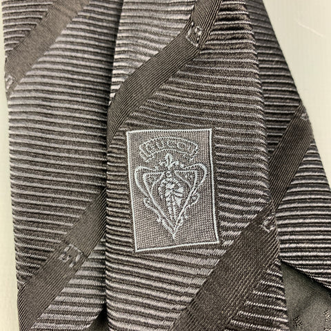Corbata de seda con rayas diagonales negras sobre negro de GUCCI