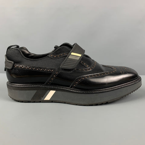 PRADA Size 11 Black Perforated Leather Wingtip Loafers
