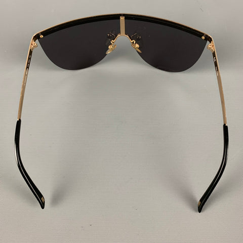Lunettes de soleil ESCADA en métal noir doré