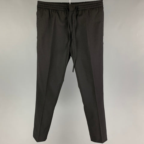 CMMN SWND Talla 32 Pantalones casuales con cinturilla elástica de lana negra