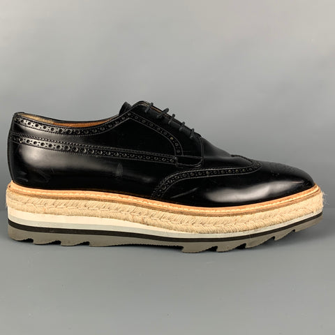 PRADA Size 11.5 Black Perforated Leather Wingtip Lace Up Shoes