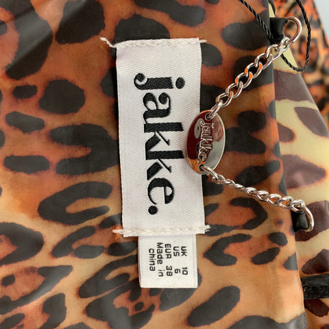 JAKKE Talla M Chubasquero de poliuretano con estampado animal, color tostado, negro y marrón