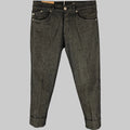 A pair of DONDUP x NOLAN indigo cotton cropped button fly jeans, displayed on a plain background.
