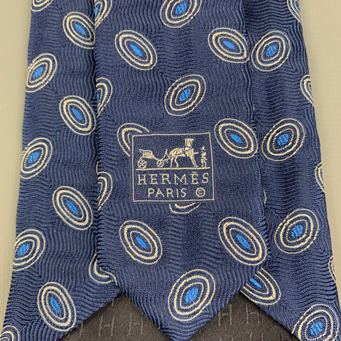 HERMES Corbata de seda ovalada azul marino y blanca
