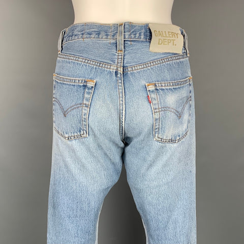DÉPARTEMENT GALERIE. Taille 26 Jean évasé unique lavé en denim bleu clair redessiné