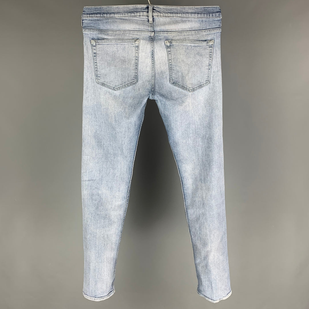 ACNE STUDIOS Talla 33 Vaqueros de algodón con puntadas en contraste azul claro